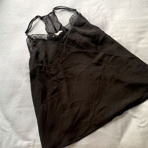Women's Lace Trimmed Black Tank. Never worn. Fits Big.
